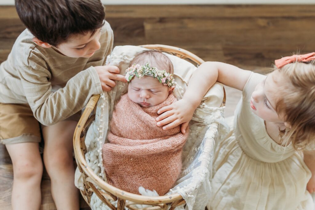 Big brother, baby, and big sister all full styled by Kate McCord Photography. 