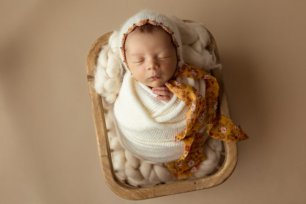 York PA newborn photographer wrapped sleeping baby posed safely
