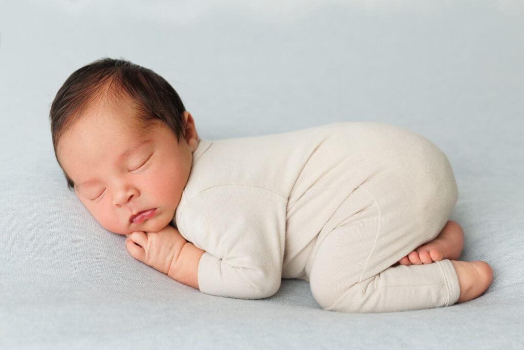 Central PA newborn photographer studio portrait of swaddled newborn baby