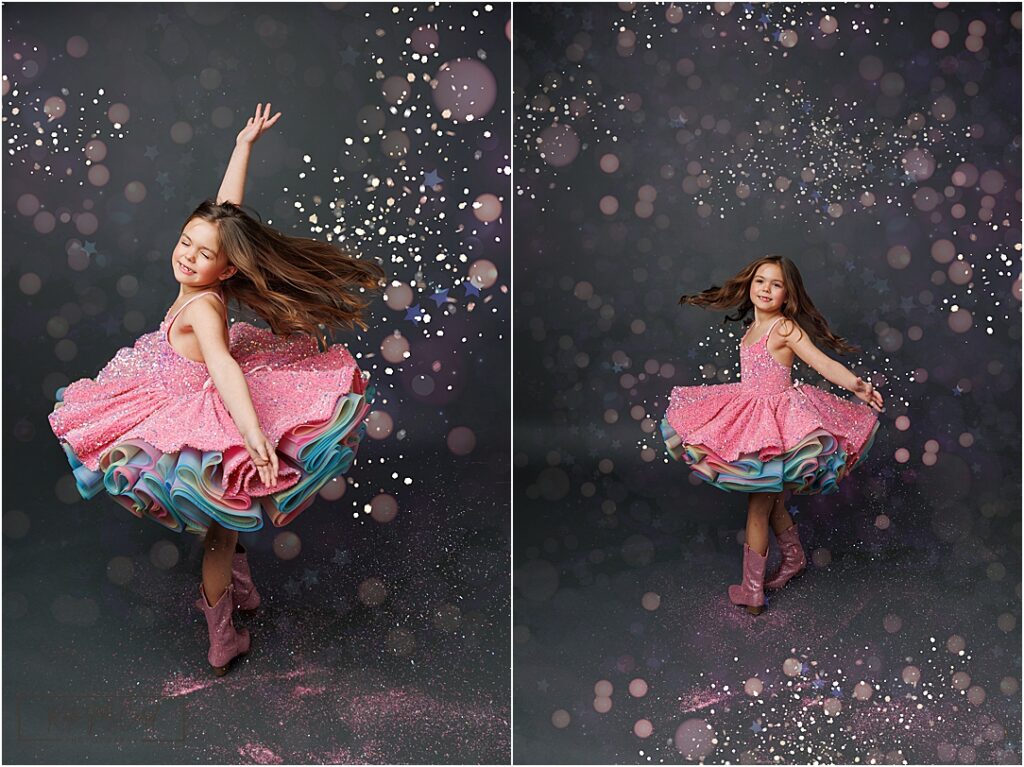 A young girl twirls joyfully in a sparkly pink dress with rainbow-layered ruffles, surrounded by glitter floating through the air. She wears pink cowboy boots and smiles with her eyes closed in one image and spins with her hair flowing in the other. The dark studio backdrop is filled with soft bokeh lights and star effects, creating a magical, whimsical scene.