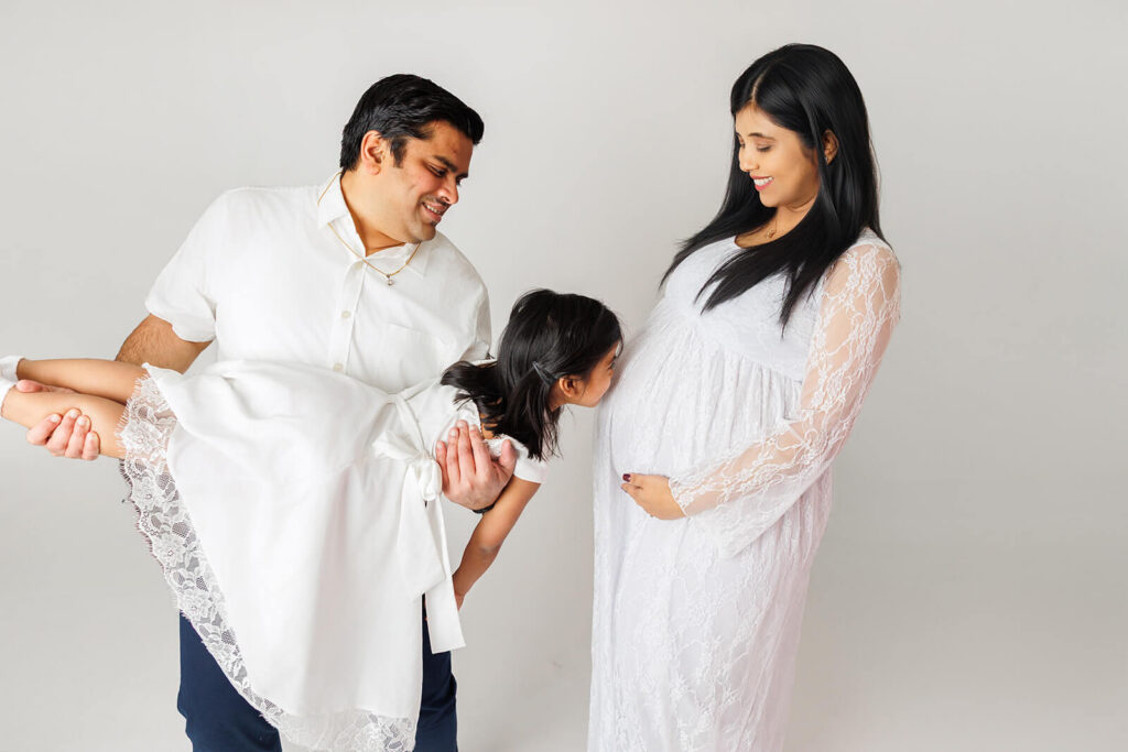 Expecting couple preparing to welcome their baby